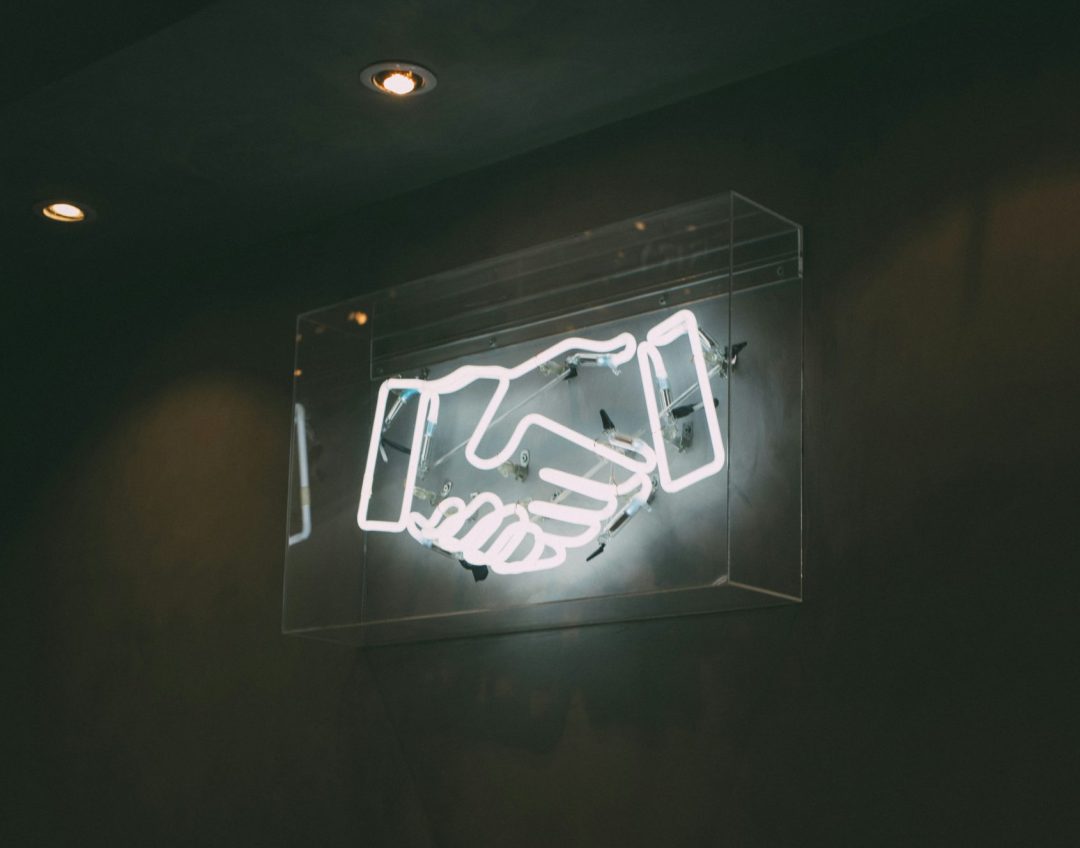 Human hand neon signage